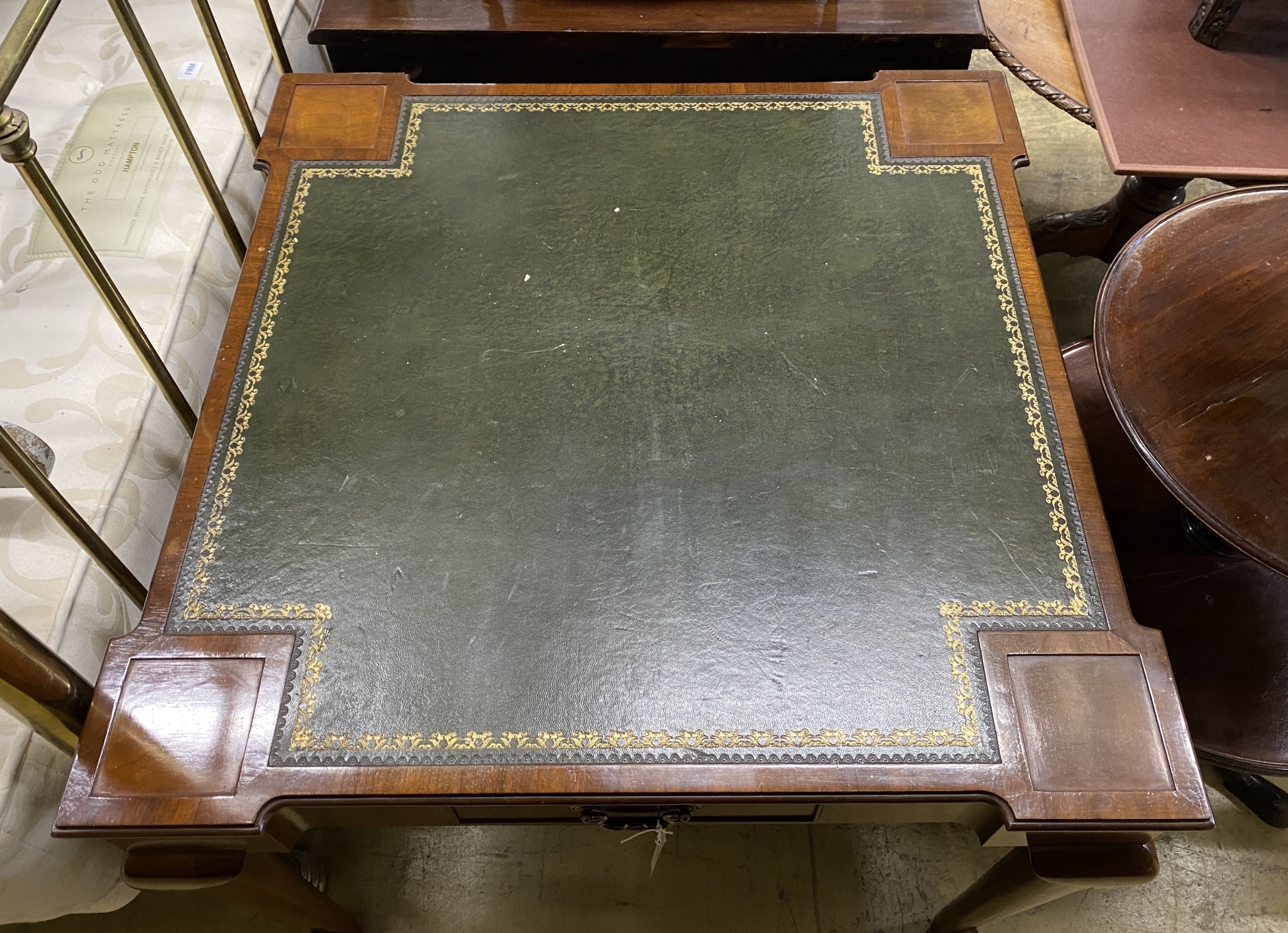 A reproduction George II style square mahogany card table with inset leather top, width 85cm, height 75cm